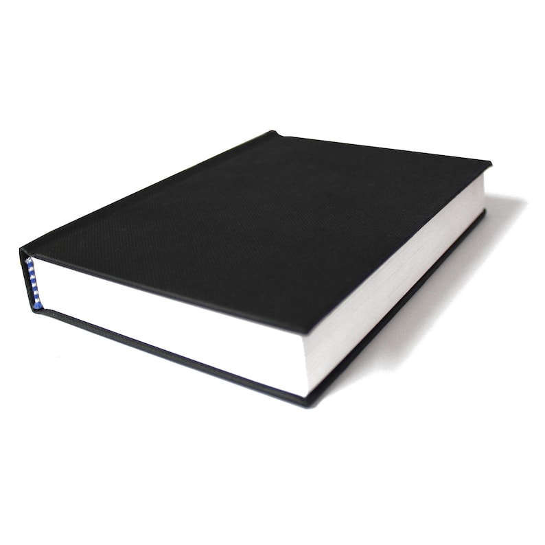 May include: A black hardcover book with a white spine and blue edging.