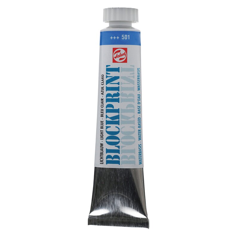 May include: A tube of light blue water-based acrylic paint labeled "BLOCKPRINT" with the brand name "Talens" and the number "501". The label also includes the text "LICHTBLAUW - LIGHT BLUE - BLEU CLAIR - AZUL CLARO" and "WATERBASIS - WATER-BASED - BASE D'EAU - WASSERBASIS".