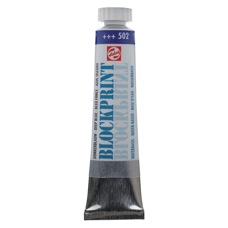 May include: A tube of Talens Blockprint water-based paint in the color deep blue. The tube is labeled with the color name in multiple languages, including English, French, German, Spanish, and Dutch. The tube also has the number 502 printed on it.
