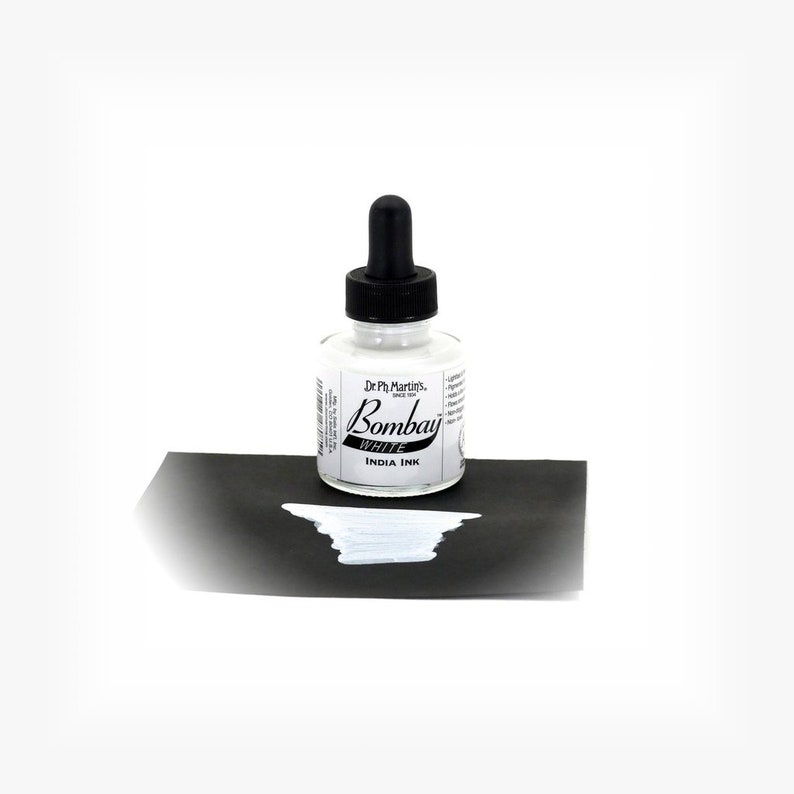 May include: A small glass bottle of white Bombay India ink by Dr. Ph. Martin's. The bottle has a black dropper cap and a white label with black text.