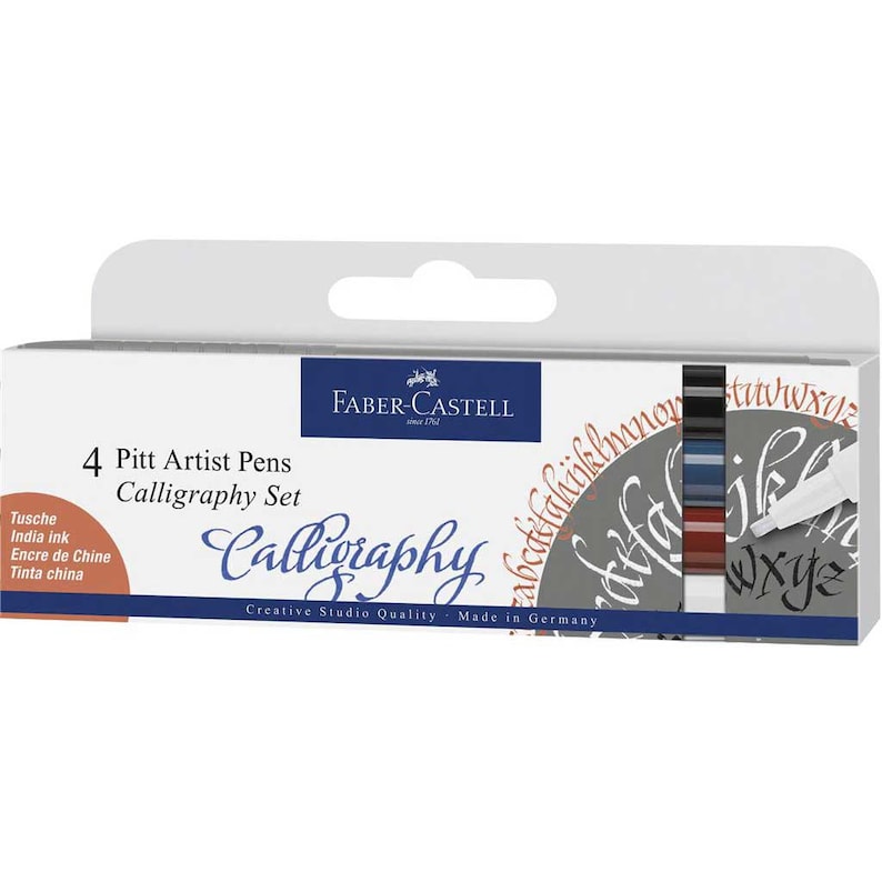 May include: A set of four Faber-Castell Pitt Artist Pens in a white box with the text "Calligraphy Set" and "Creative Studio Quality - Made in Germany". The pens are black, blue, red, and brown.