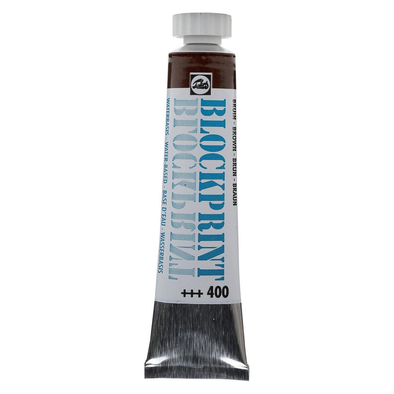 May include: A tube of brown Blockprint water-based paint with the text "BRUIN - BROWN - BRUN - BRAUN" and "BLOCKPRINT +++ 400" on the label.