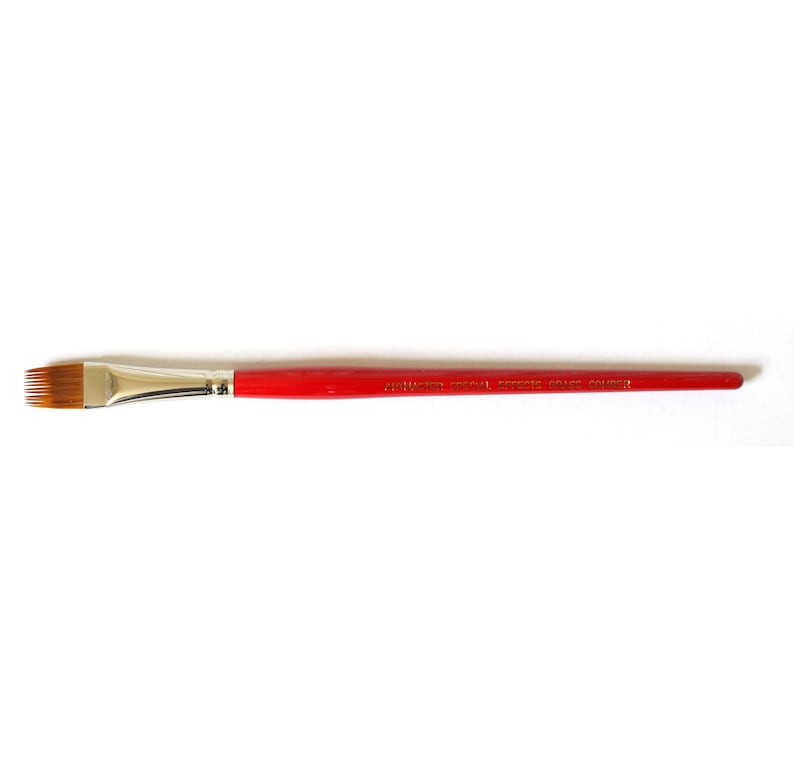 May include: A red handled paint brush with a flat, angled bristle head. The brush is labeled "Artist's Brush Series Grade:  Copper".