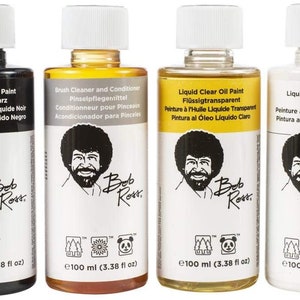 May include: Four 100 ml bottles of Bob Ross Liquid Oil Paint. The bottles are labeled with the paint color: Liquid Black Oil Paint, Brush Cleaner and Conditioner, Liquid Clear Oil Paint, and Liquid White Oil Paint. Each bottle features a portrait of Bob Ross.