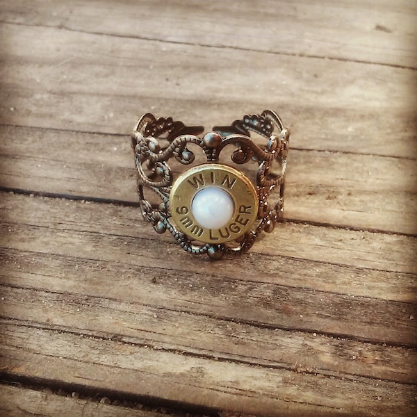 Filigree bullet ring with pearl center