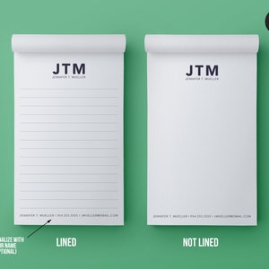 May include: Two white notepad mockups with the text "JTM" and "JENNIFER T. MUELLER" at the top. The notepad on the left has lined paper and the notepad on the right has plain white paper. The text "LINED" is below the left notepad and the text "NOT LINED" is below the right notepad.