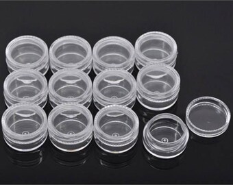 12 boxes form round 30mm beads and findings