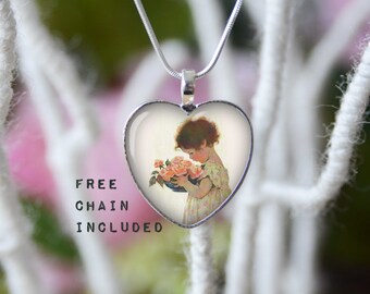 Girl with flowers vintage Jessie Willcox Smith art heart shape necklace. Romantic gift pendant. Free matching chain is included.