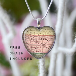 Rapid City South Dakota heart shape vintage map necklace. Location gift pendant. Free matching chain is included.