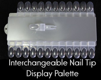 Paleta de colores de esmalte de uñas con puntas intercambiables, herramienta de manicura reutilizable y muestrario.