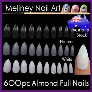 May include: 600 piece set of almond shaped full cover press-on nails in natural and white colours. The nails are shown in rows on a black background. The text "Australia Stock" is visible in the top right corner of the image.