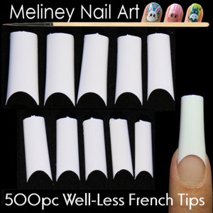 May include: 500 white well-less French nail tips, designed for professional nail art applications. The tips are shown in two rows of 7, with a single tip on a finger in the bottom right corner.