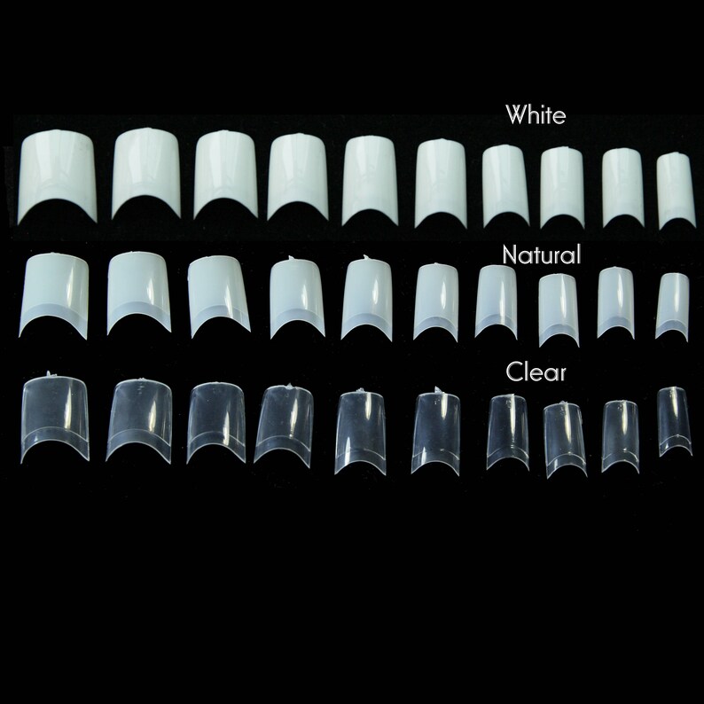 May include: A set of 30 full cover nail tips in three colors: white, natural, and clear. The tips are arranged in rows, with each row representing a different color.