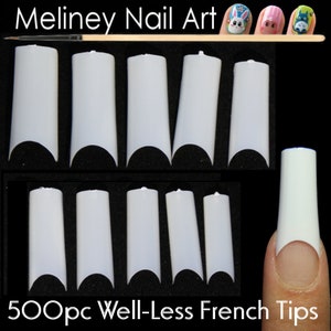 May include: 500 white well-less French nail tips in various sizes. The tips are arranged in two rows on a black surface. The tips are designed for use with acrylic or gel nail extensions.