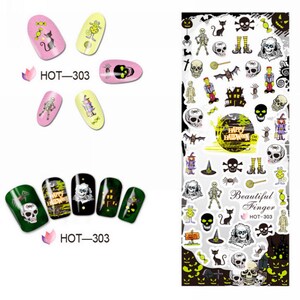 Puede incluir: Pegatinas de arte de u&ntilde;as de Halloween con una variedad de dise&ntilde;os, incluyendo calaveras, murci&eacute;lagos, fantasmas, calabazas y dulces. Las pegatinas est&aacute;n sobre un fondo blanco y est&aacute;n listas para ser aplicadas a las u&ntilde;as.