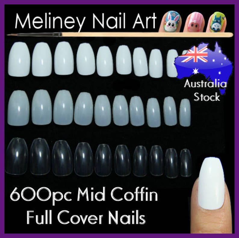 May include: 600 piece set of mid coffin full cover nails in clear, natural, and opaque white colours. The nails are arranged in rows by size and colour. The image also includes a close-up of a finger wearing a white nail.
