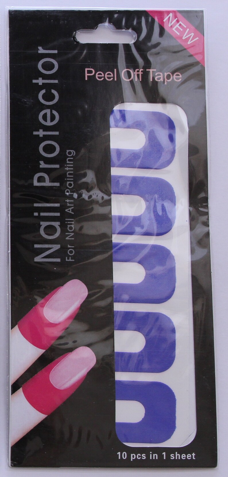 May include: A pack of purple peel-off tape for nail art. The pack has a black background with the text "Nail Protector" and "Peel Off Tape". The tape is in a sheet with 10 pieces. The pack also includes the text "For Nail Art Painting" and "10 pcs in 1 sheet".