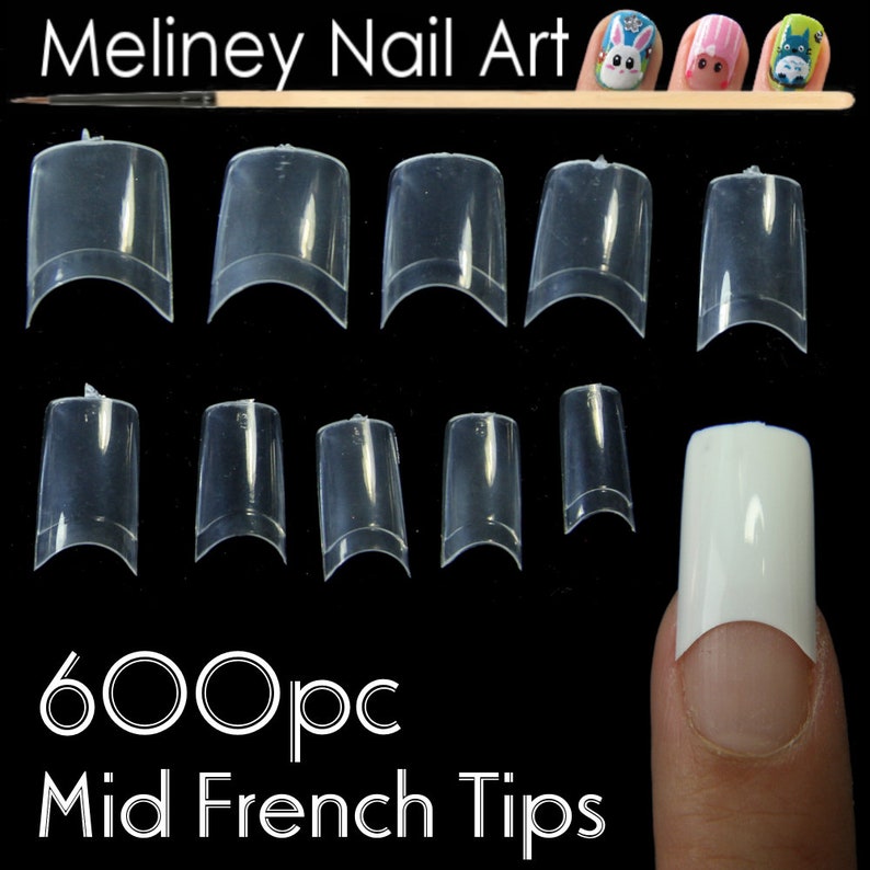 May include: 600 clear plastic false nail tips for mid-french manicures. The tips are arranged in rows on a black background. A finger with a white tip is shown on the right side of the image.
