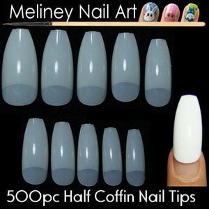 May include: 500 clear half coffin nail tips. The tips are arranged in two rows of ten. The tips are a translucent white color and have a rounded edge.