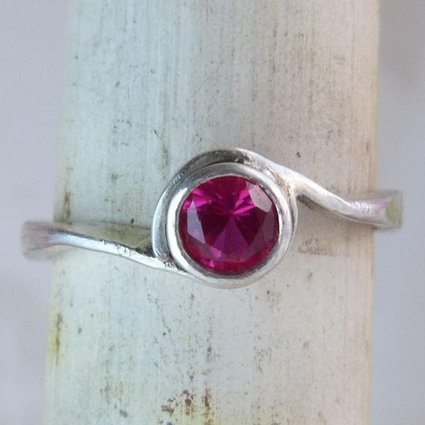 Sterling Silver Deep Pink Cubic Zirconia Twist Setting Solitaire Ring.