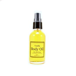 May include: A clear glass bottle with a black pump top filled with yellow body oil. The label reads "Vanilla Body Oil fast absorbing with vitamins E, A and Coconut 60ml PurePresence"