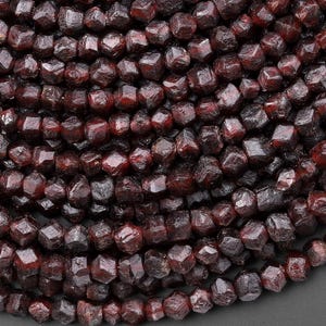 May include: A set of three ceramic mugs with a speckled, matte finish. The mugs are in shades of cream, light gray, and dark gray. Each mug has a simple, minimalist design, perfect for coffee or tea.