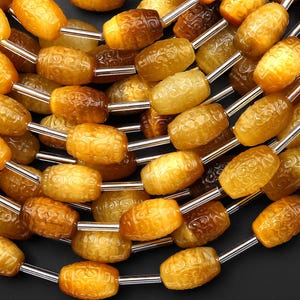 May include: A set of three ceramic mugs with a speckled, matte finish. The mugs are in shades of cream, light gray, and dark gray. Each mug has a simple, minimalist design, perfect for coffee or tea.