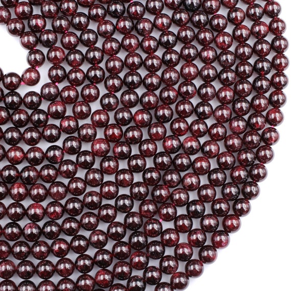 Wooden Beads 8mm, Red color, 100 beads strung on a 14 inch white string  -B2881