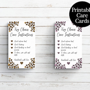 May include: Two printable care cards with a leopard print design. The cards have the text "Key Chain Cave Instructions" and list care instructions for the keychains. The instructions include: Avoid extreme heat, Avoid dropping, Avoid brushing on hard surfaces, To clean, wipe with soft cloth, Handmade with love.