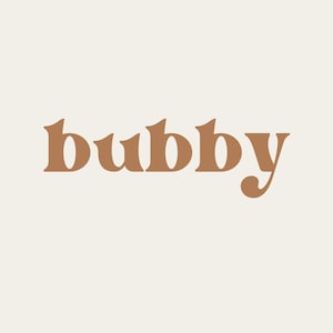 May include: A brown text graphic with the word "bubby" in a stylized font.