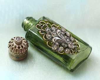 Vintage Olivine Green Perfume Bottle: Bronze Fleur de Lis, Crystal Accent
