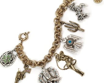 Bracciale con ciondolo western: gioielli da cowgirl in bronzo brunito