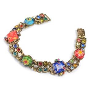 May include: A multi-coloured bracelet with a gold chain and colourful glass beads. The beads are decorated with flowers and other patterns.