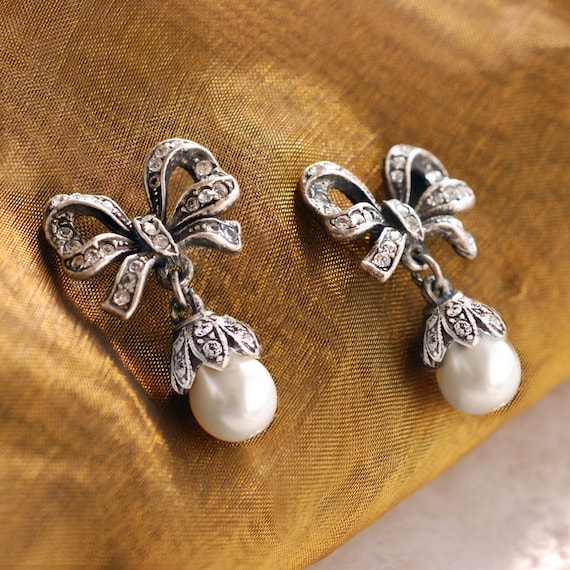Pearl Bow Stud Earrings | FashionCrab.com