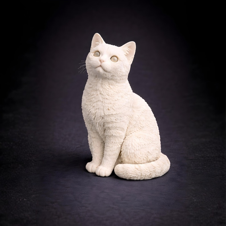 3D printable cat STL calm sitting pose looking up, detailed fur texture, printable cat figurine model