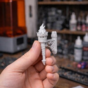 3D printed medieval torch wall prop STL file, fantasy decor model for tabletop RPG, resin printable miniature accessory