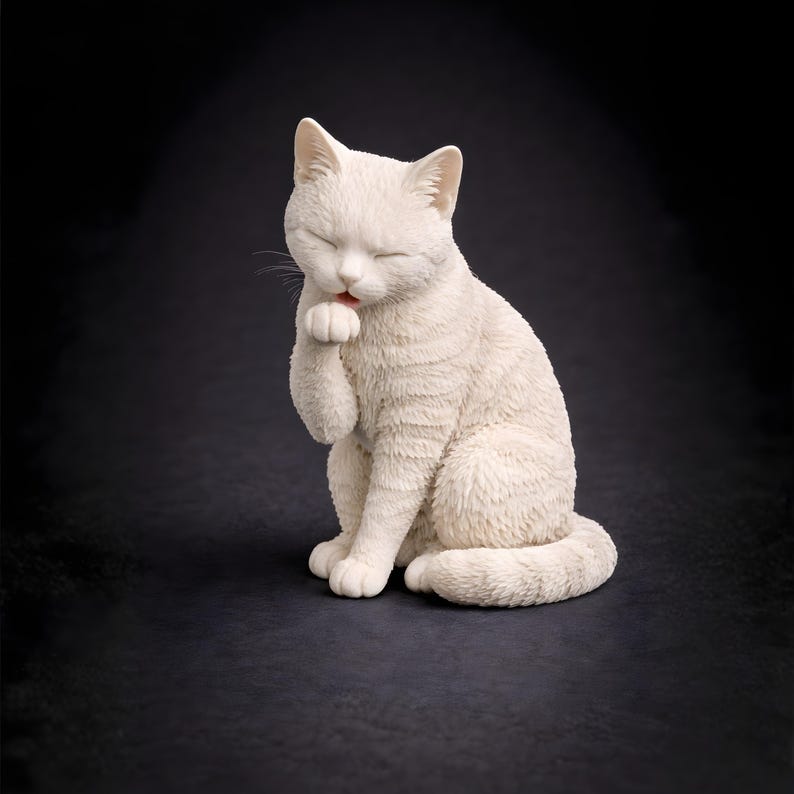3D printable cat STL grooming pose licking paw, expressive cat figurine model for 3D printing