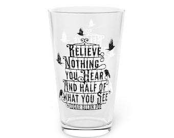 May include: A clear glass pint glass with a black and white graphic print that reads "Believe nothing you hear and half of what you see" with the name Edgar Allan Poe underneath. The graphic also includes several black birds.