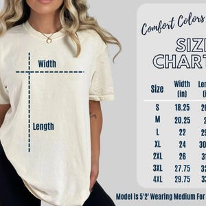 May include: Cream-colored t-shirt with a size chart and the text "Comfort Colors C1717". The size chart shows measurements in inches for width and length, ranging from size small to 4XL. The model is 5'2" wearing a medium.