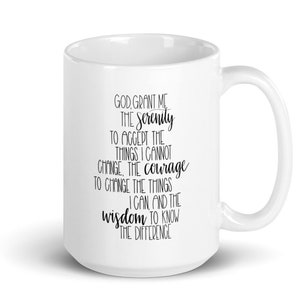 May include: White ceramic mug with a curved handle. The mug features black text that reads "God, grant me the serenity to accept the things I cannot change, the courage to change the things I can, and the wisdom to know the difference."
