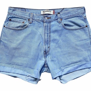 Vintage 90s Levi 550 shorts cutoffs relaxed fit 39 in waist high waisted jean denim shorts light blue leather patch red tab cuffed womens