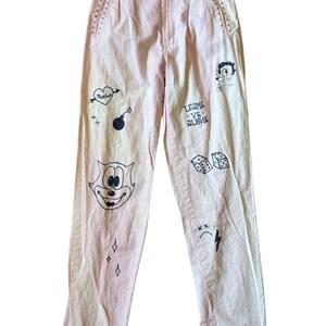 Vintage 70’s Baby pink faded pants by New Departures drawn on petunia Felix detail custom pockets ramie cotton 27 inch waist soft long