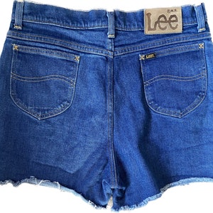 Vintage Lee Cutoff Jean Shorts dark blue denim high waisted 33 inch waist womens high waisted large back leather patch slight stretch frayin