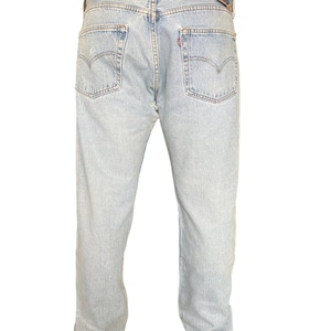 Levis 501 vintage anni &#39;90 lavaggio chiaro con patta e bottoni, realizzati negli USA, cotone morbido e sottile, taglia 38/32, fianchi da uomo e da donna o alti