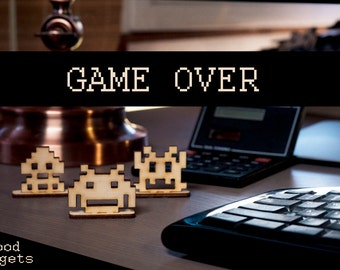 Dianas de tiro de Space Invaders. Dianas de madera para armar. Perfectas para pistolas de gomas elásticas o ballestas de madera. El regalo perfecto para frikis y juegos espaciales.