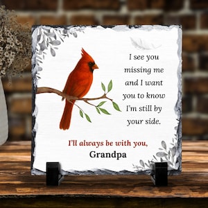 May include: A square slate plaque featuring a vibrant red cardinal perched on a branch. The plaque includes the text "I see you missing me...I'm still by your side. I'll always be with you, Grandpa."