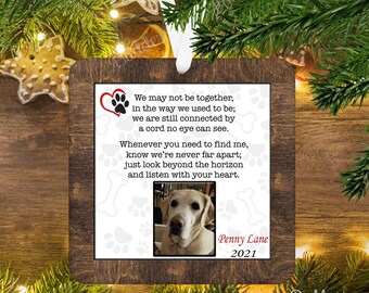 May include: Wooden Christmas ornament with a dark brown frame, featuring a photo of a yellow Labrador Retriever. The ornament includes a poem and the name "Penny Lane" with the year 2021.