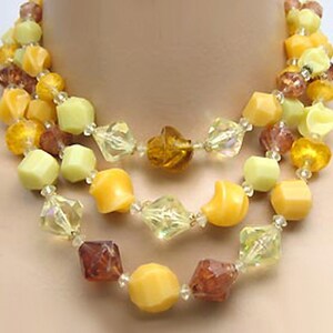 Collier 3 rangs en lucite or jaune et topaze brune