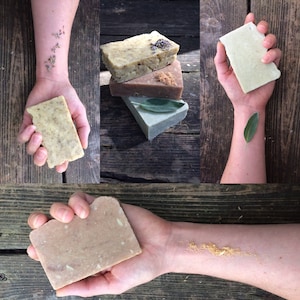 May include: Four bars of handmade soap, each with a different color and scent. The soaps are arranged in a stack on a wooden surface. The soaps are made with natural ingredients and are free of harsh chemicals.
