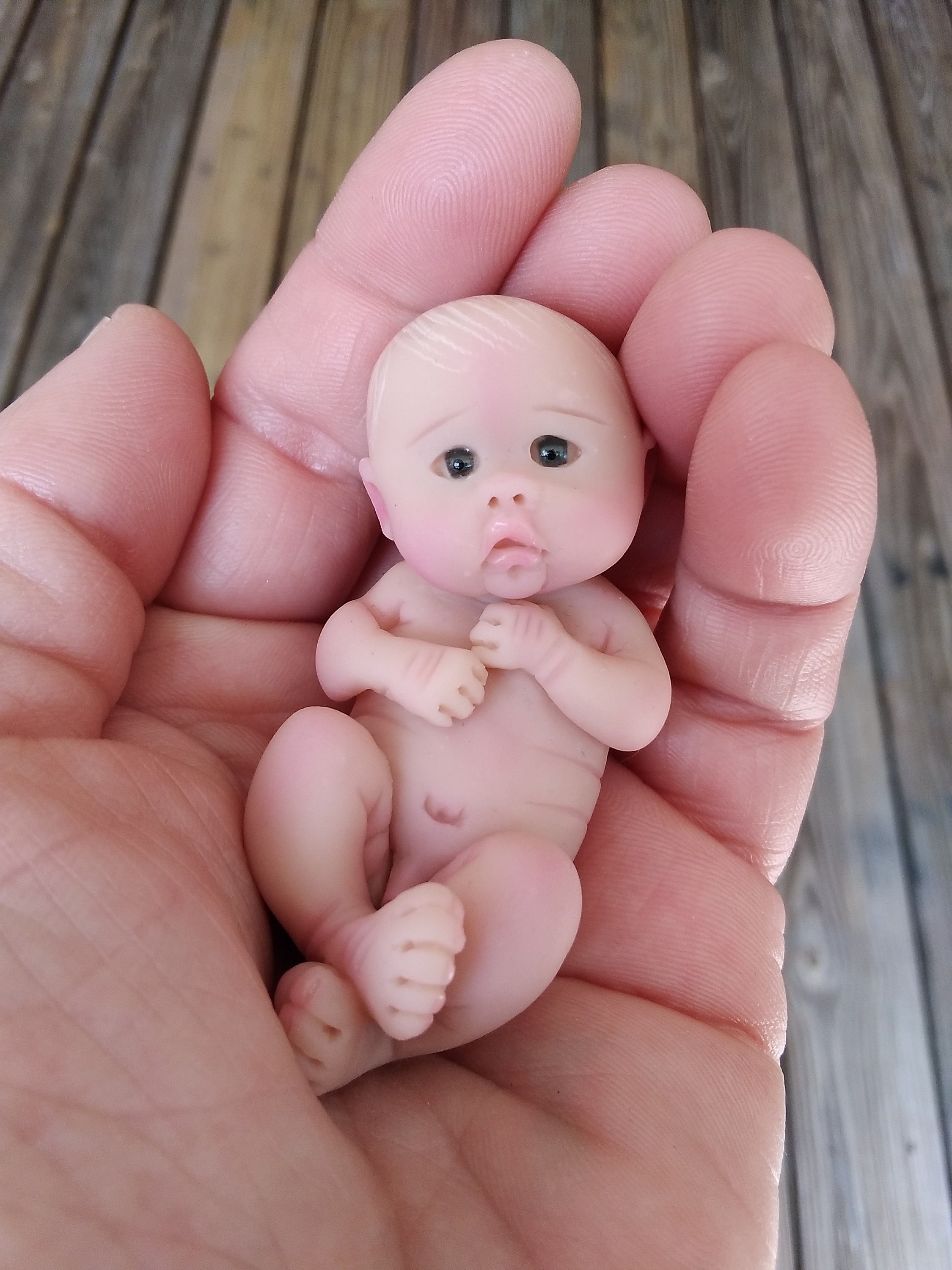 Clay baby doll on sale